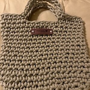 Crocheted handmade Beige handbag with attached straps. 71/2” x 81/2” New
